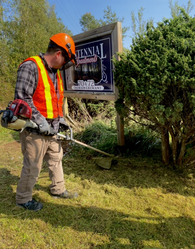 man doing yardwork