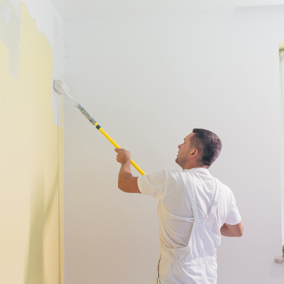 Man painting wall